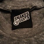 t shirt tags snakes and suits